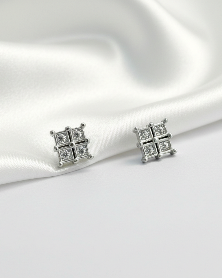 Pure 925 SilverQuad-Set Diamond Style Studs.  925/010