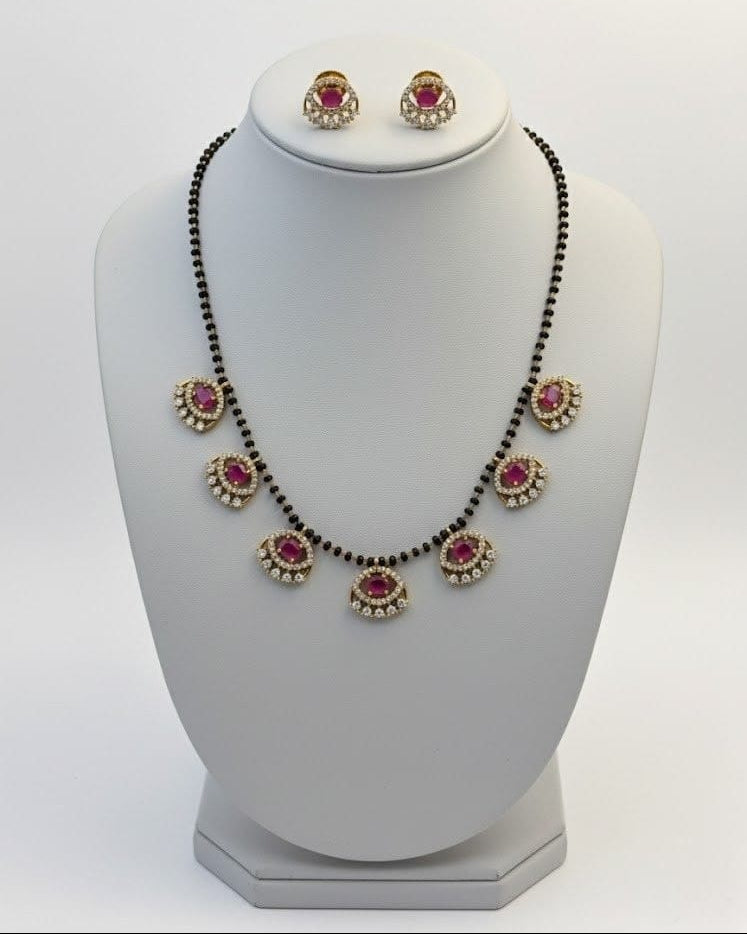 Gold-Toned Evil Eye Mangal Sutra with Seven Ruby Charms MNG015