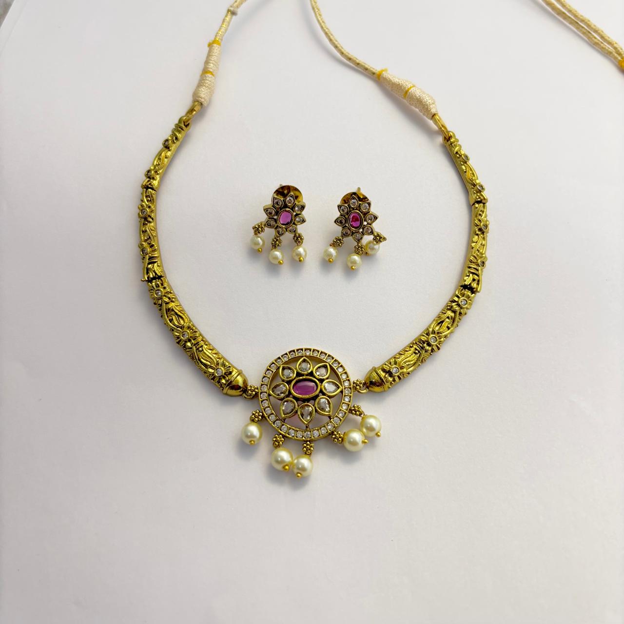 Antique Gold-Plated Choker Set with Ruby Stones, Kundan Work, and pearl Droplets CH011
