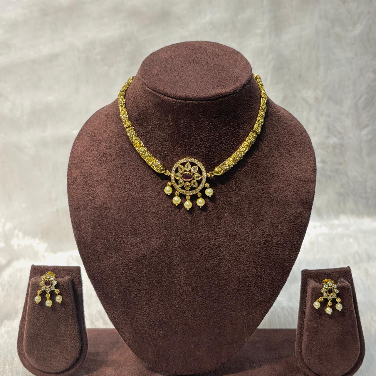 Antique Gold-Plated Choker Set with Ruby Stones, Kundan Work, and pearl Droplets CH011